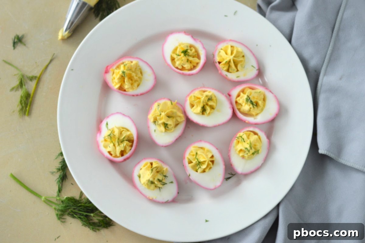 Keto Pickled Deviled Eggs served alongside complementary dishes