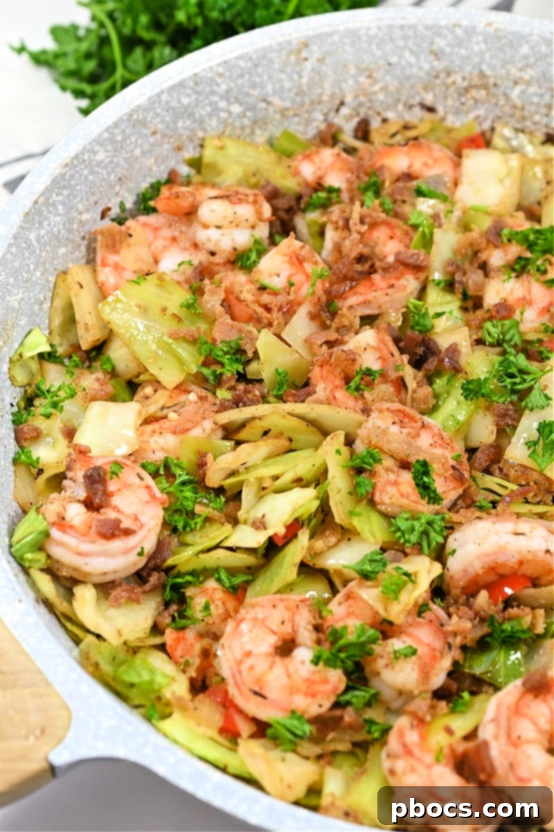 Airtight Container with Meal Prepped Keto Jerk Shrimp and Cabbage