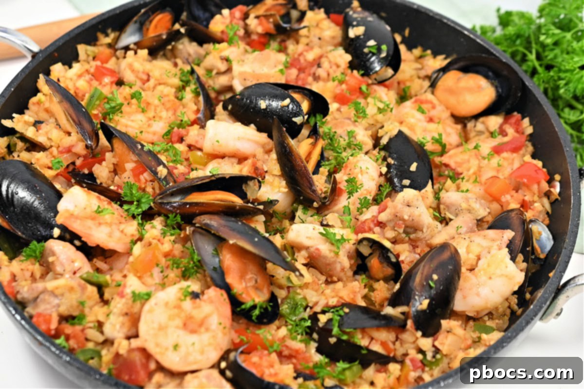 Freshly prepared cauliflower rice, ready for paella