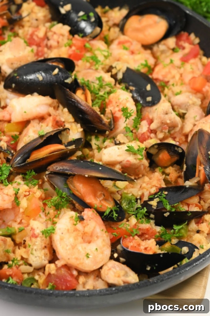 Assorted chicken, mussels, and shrimp, ideal for Keto Paella