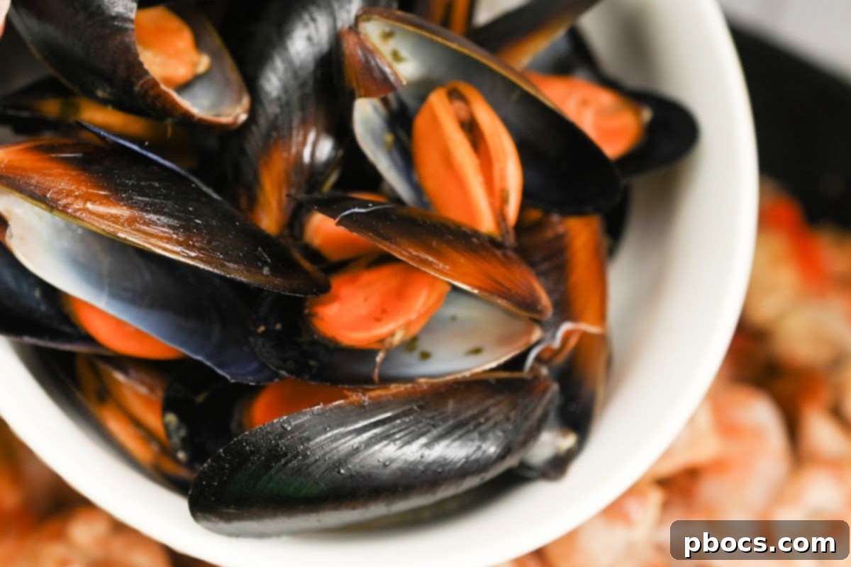 Steamed mussels, perfectly opened and ready for the paella