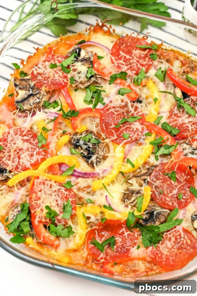 Keto Beef Pizza Bake 7 Keto Ground Beef Pizza Casserole in a baking dish, ready for storage