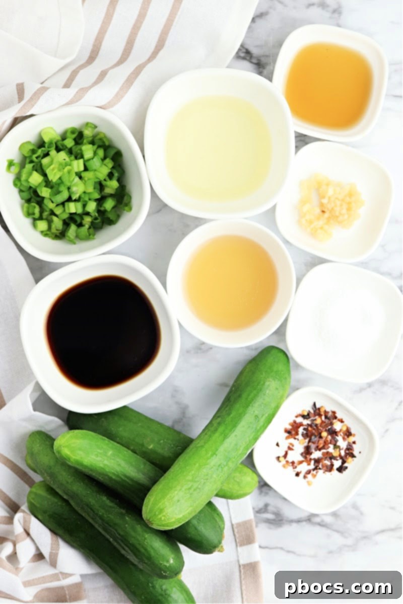 Vibrant Korean Cucumber Salad 8 All the fresh ingredients for Keto Korean Cucumber Salad laid out on a white surface