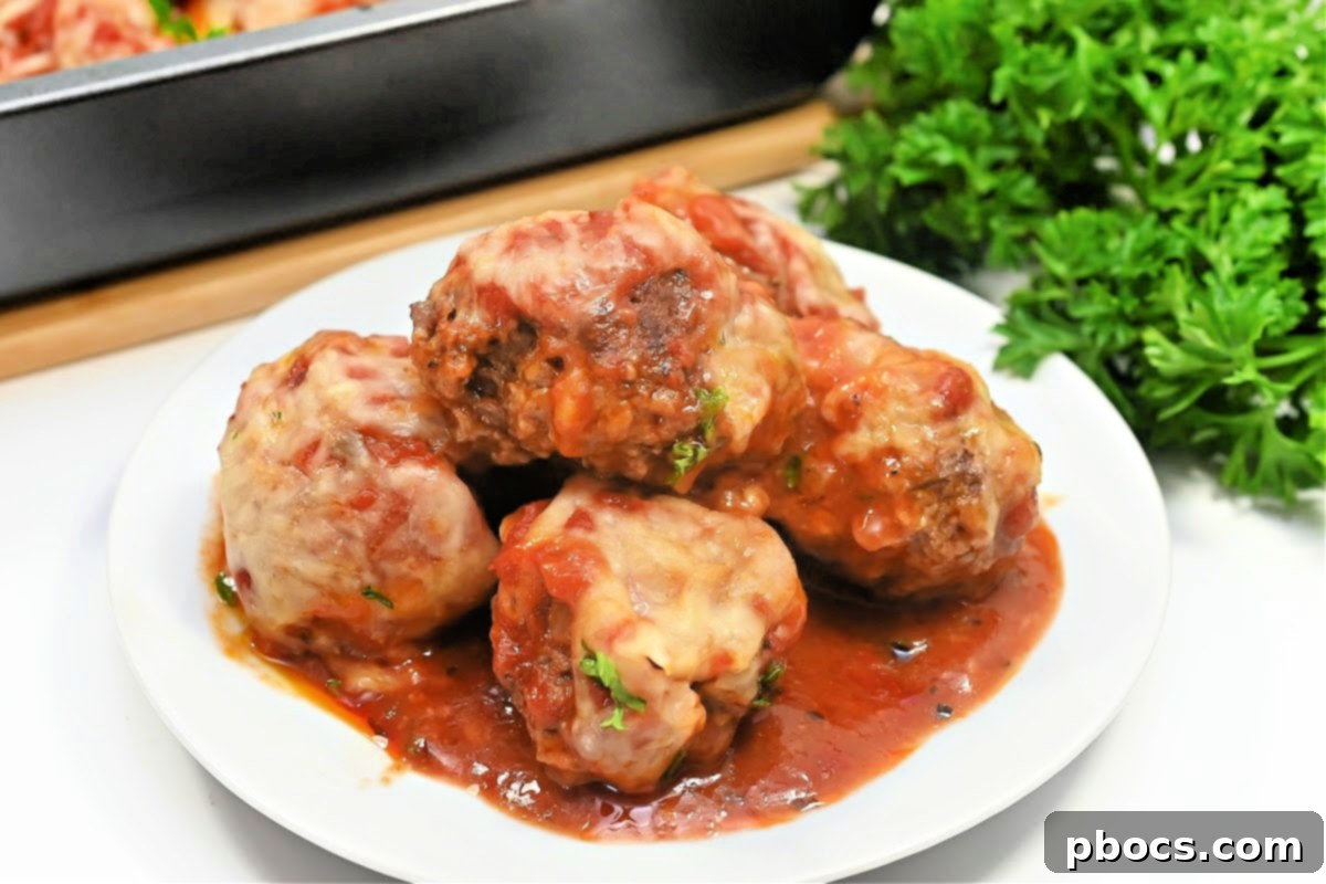 Keto Saucy Cottage Cheese Meatballs served with zucchini noodles