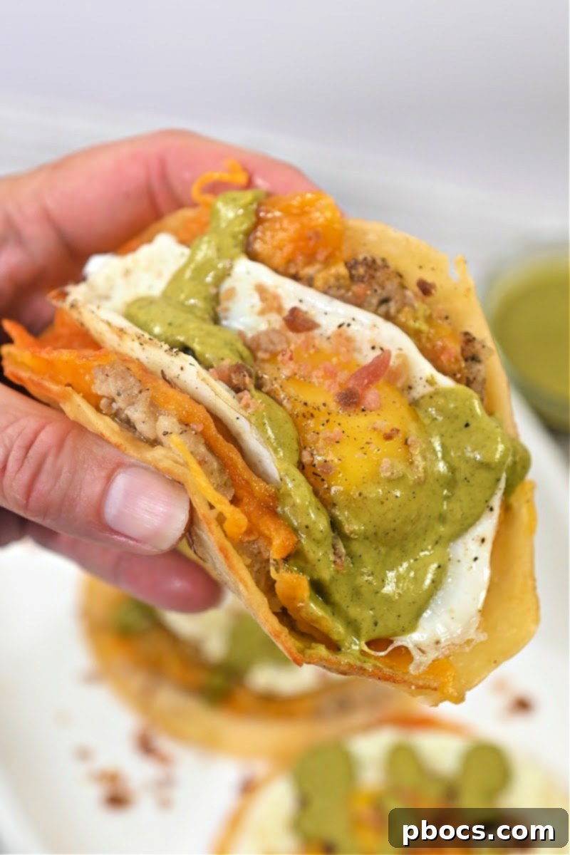 Keto Bacon Egg Sausage and Cheese Smash Tacos