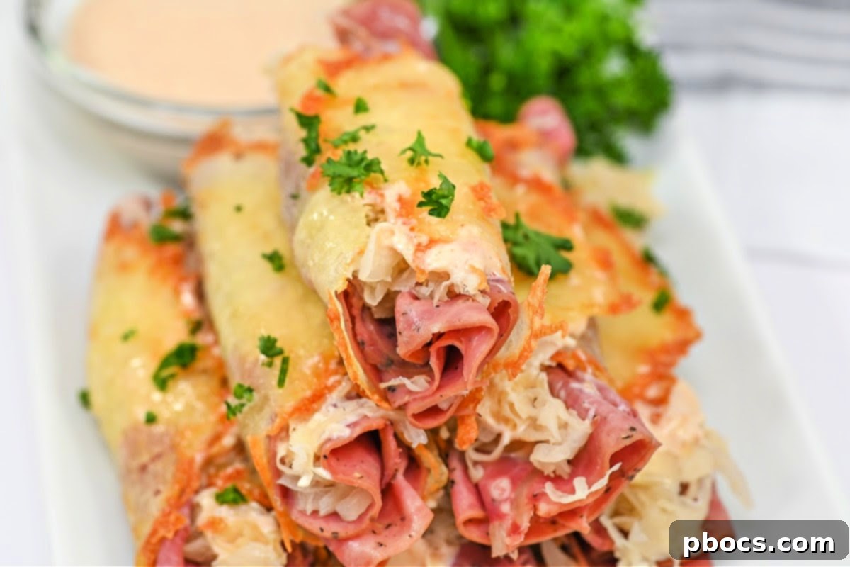 Crispy Keto Reuben Roll-Ups, freshly rolled and cooling