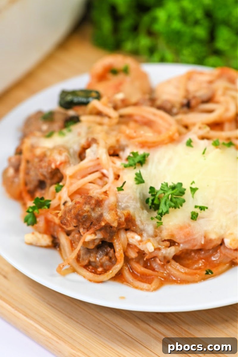 Keto Cottage Cheese Pasta Bake in a baking dish, garnished with fresh herbs