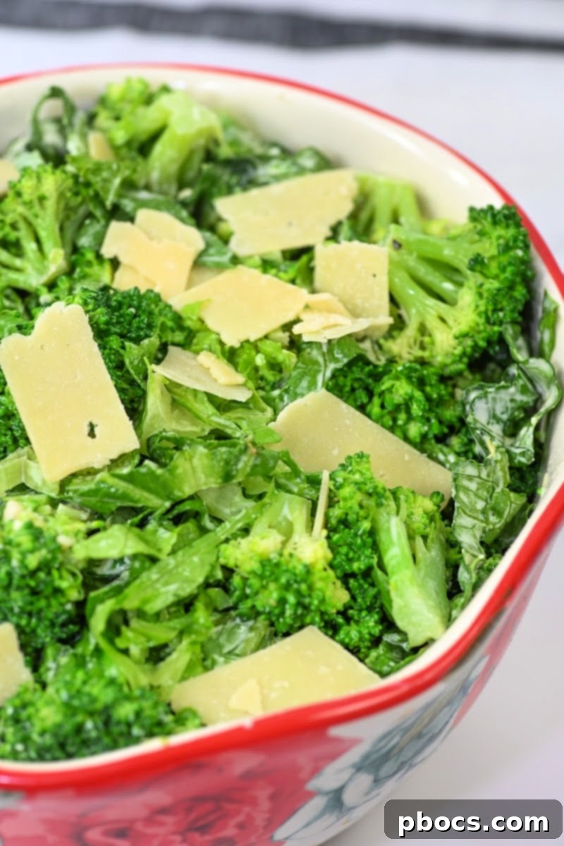 Keto Broccoli Caesar Crunch 11 Tossing shaved Parmesan cheese and crispy croutons into the Keto Caesar Broccoli Salad