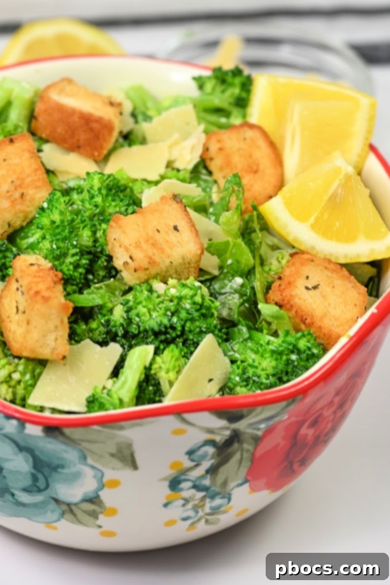 Keto Broccoli Caesar Crunch 5 Assembling a Keto Caesar Broccoli Salad with chopped lettuce and steamed broccoli