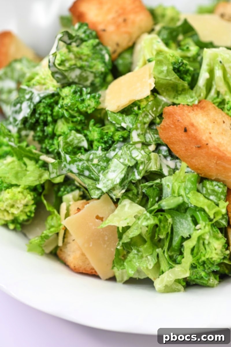 Keto Broccoli Caesar Crunch 6 Keto Caesar Broccoli Salad served alongside pan-seared chicken thighs