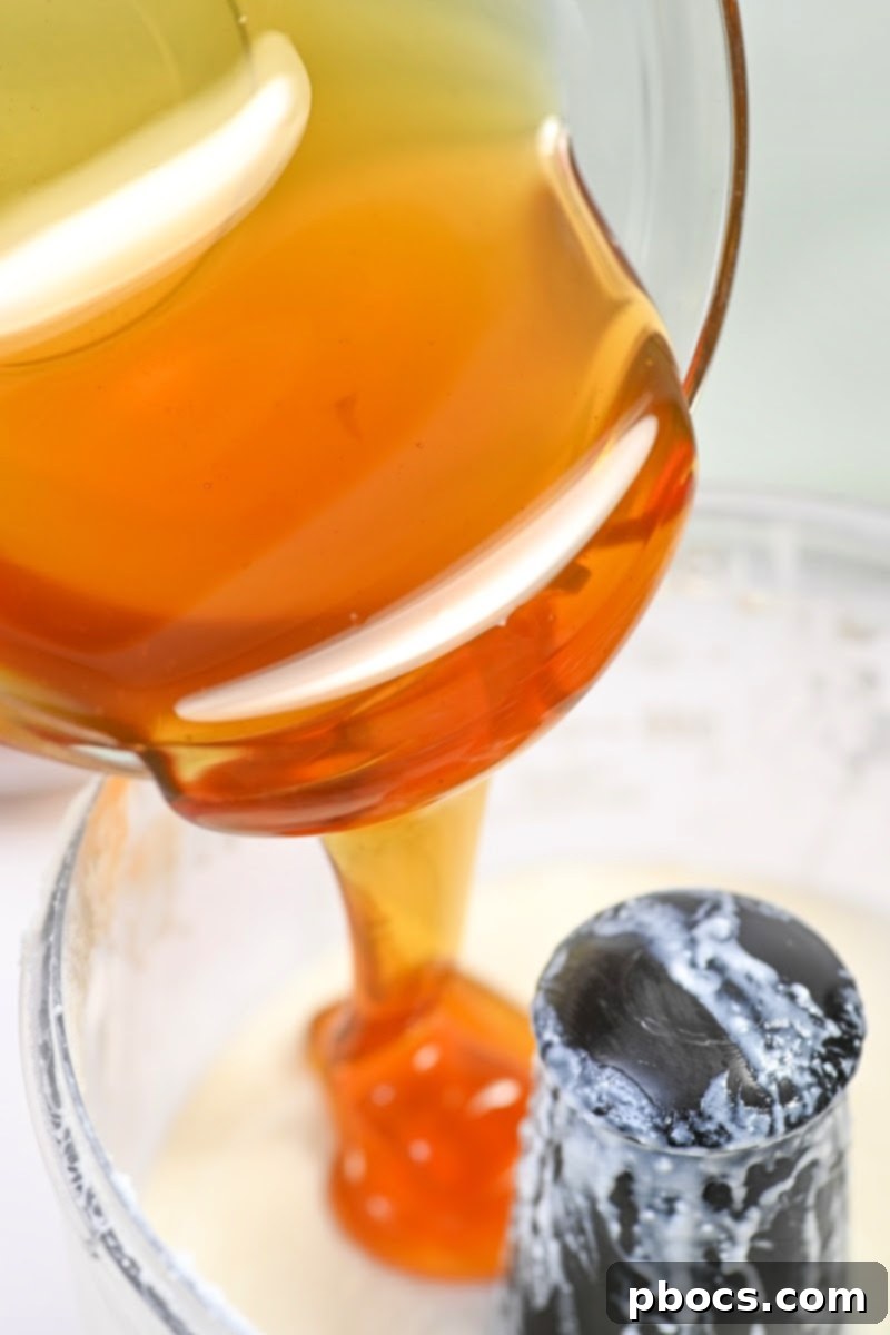Adding sugar-free honey to the food processor
