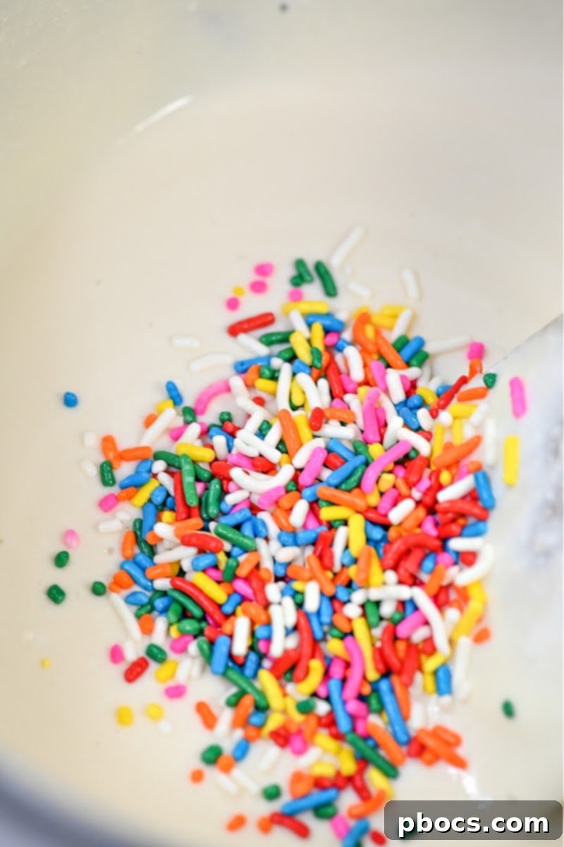 Adding sprinkles to the cottage cheese mixture