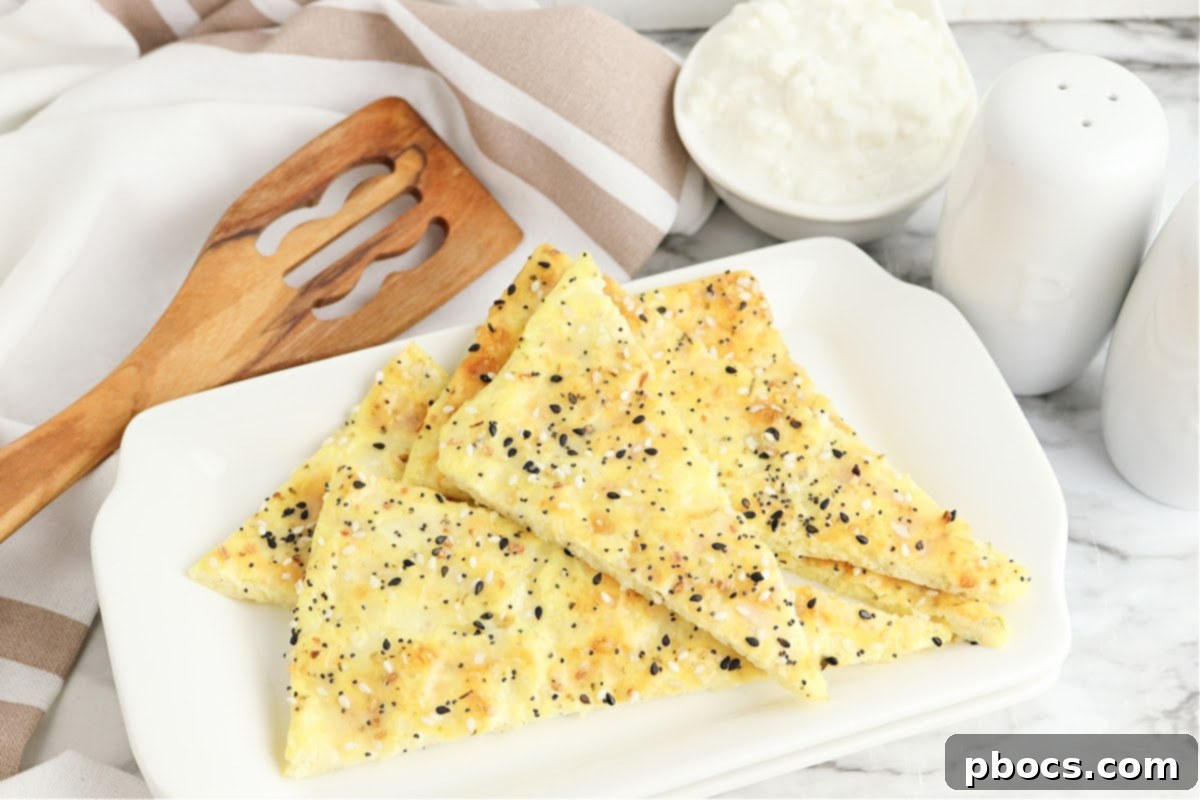 Keto Cottage Cheese Flatbread garnished with herbs and seasonings