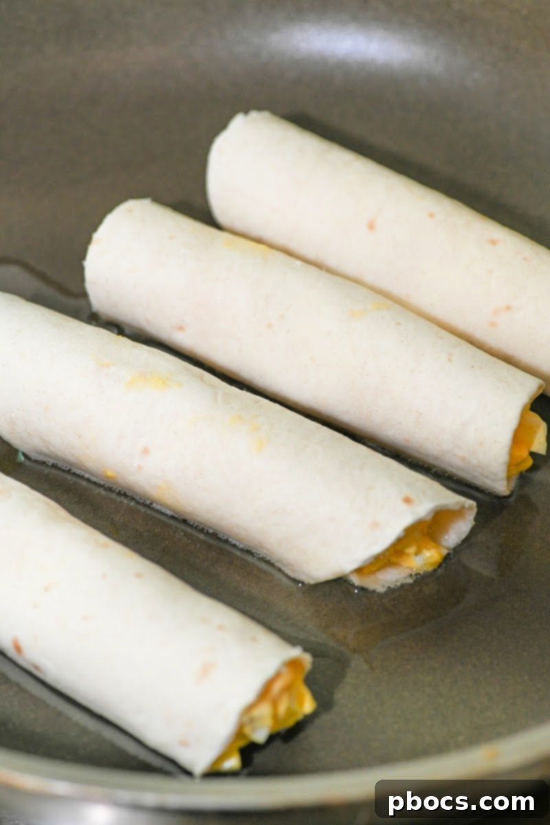 Frying the roll ups in a skillet