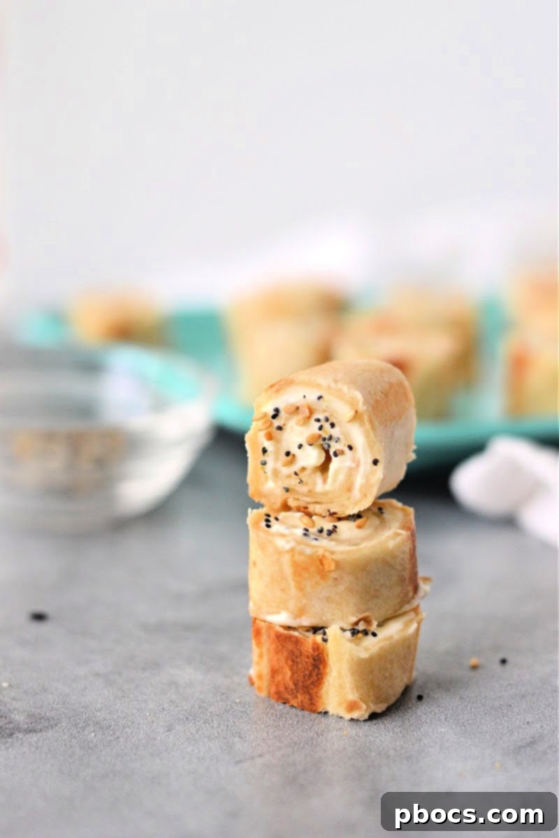 Keto Cream Cheese Bagel Poppers 2 Delicious Keto Cream Cheese Bagel Bites on a plate, ready to be enjoyed as a snack or appetizer.