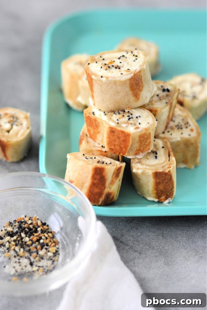 Keto Cream Cheese Bagel Poppers 3 Close-up of freshly prepared Keto Cream Cheese Bagel Bites, showcasing the golden-brown exterior and visible seasoning.