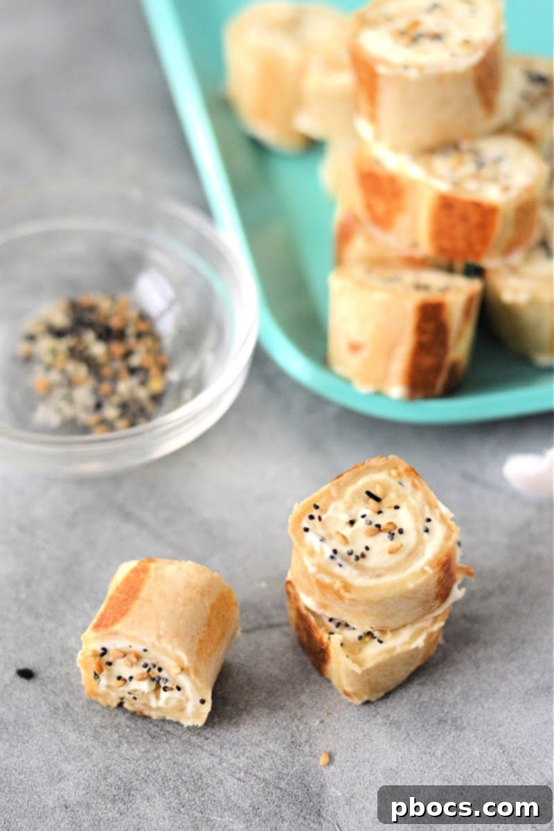 Keto Cream Cheese Bagel Poppers 7 Keto Cream Cheese Bagel Bites stored in an airtight container, showcasing make-ahead meal prep possibilities.