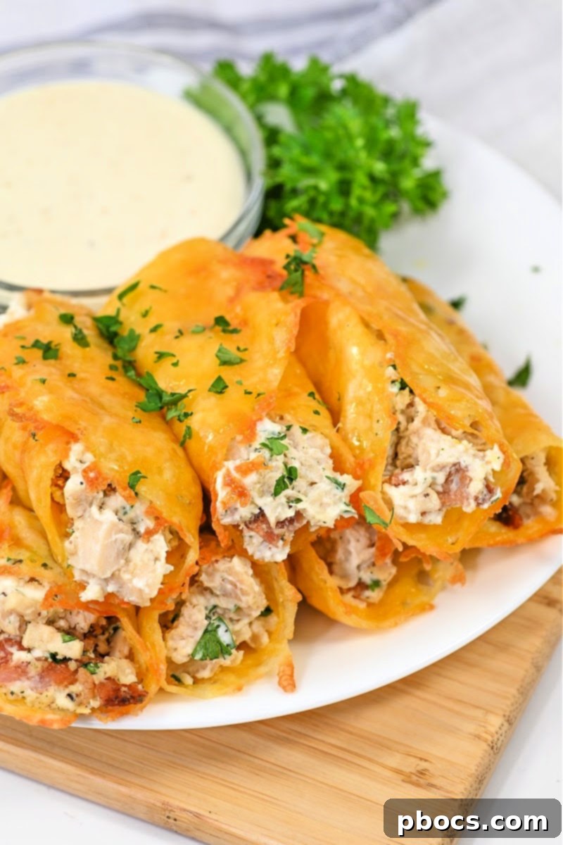 Keto Chicken Bacon Ranch Pinwheels 6 Keto Chicken Bacon Ranch Roll-Ups with a side salad