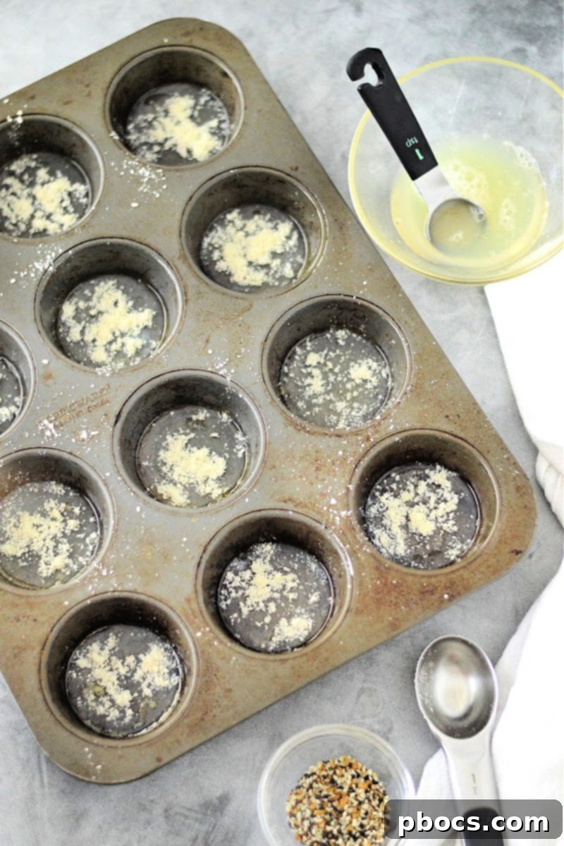 Egg whites in muffin tin ready for seasoning