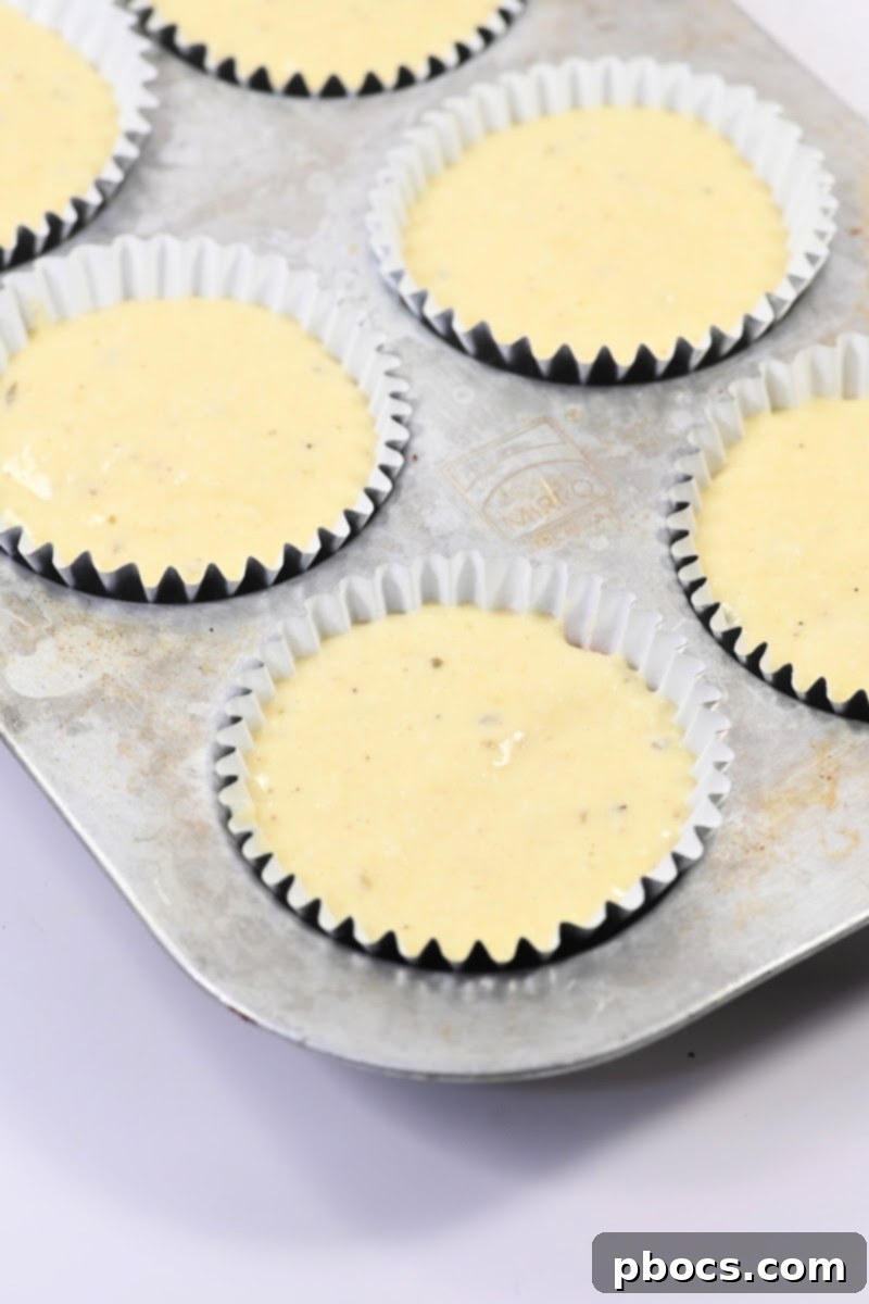 Keto Pizza Poppers 13 Topping muffins with another layer of batter