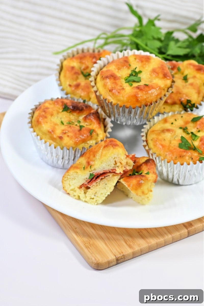 Keto Pizza Poppers 6 Keto cottage cheese pizza muffins served with delicious side dishes