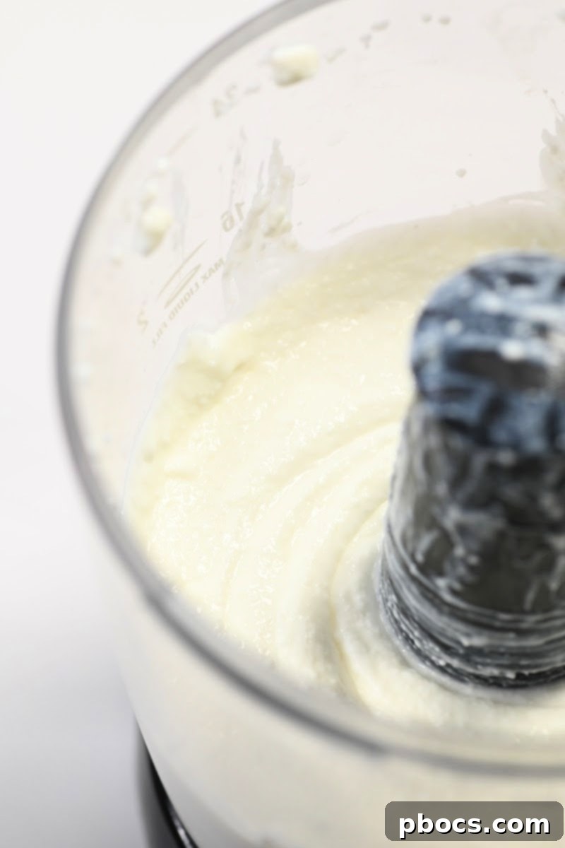 Keto Pizza Poppers 9 Pureeing cottage cheese until smooth for the muffin batter