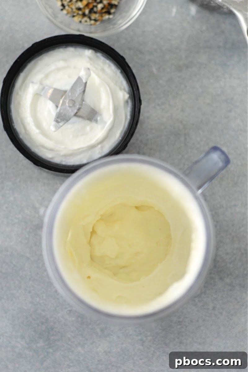 Cottage cheese being blended in a food processor until smooth and creamy.
