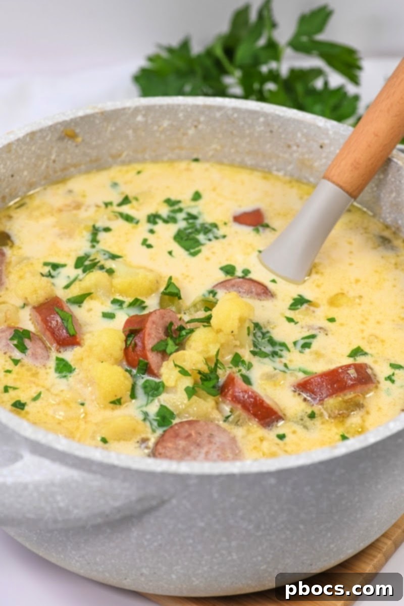 Another perspective of the creamy Keto Creamy Kielbasa and Cauliflower Soup in a bowl