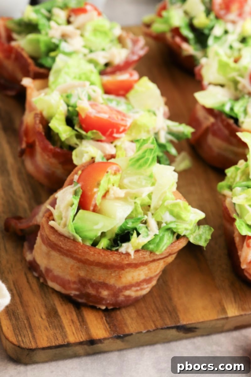 Muffin tin upside down with bacon slices wrapped around for cups
