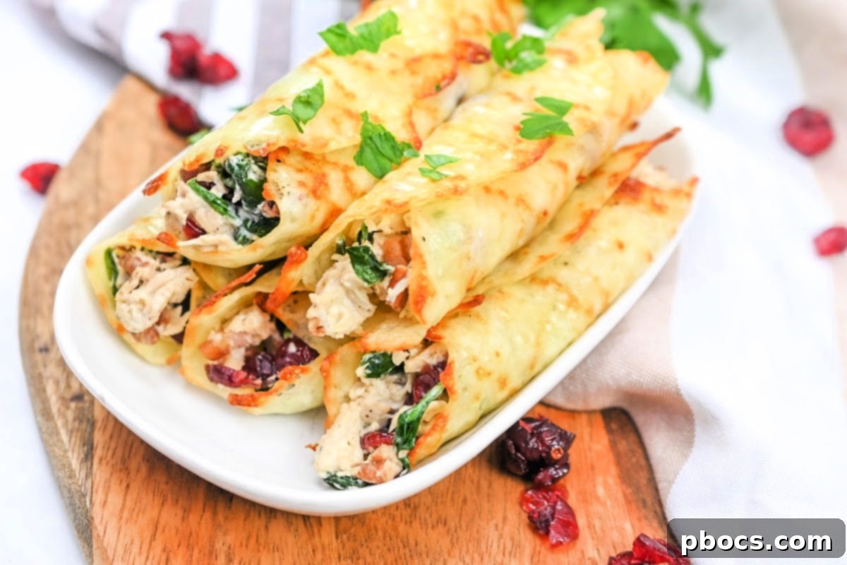 Crispy Low Carb Cranberry Pecan Chicken Roll Ups being formed