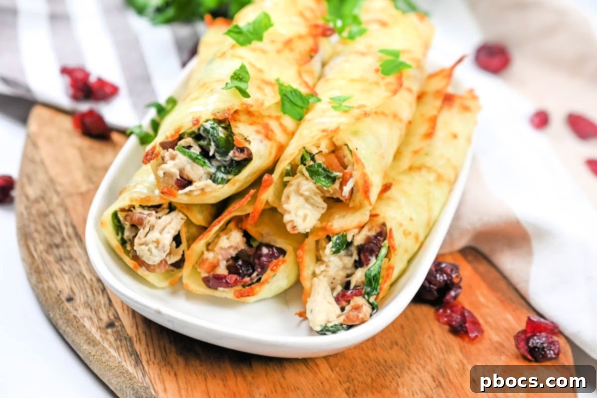 Shredded chicken being mixed with other ingredients for the filling