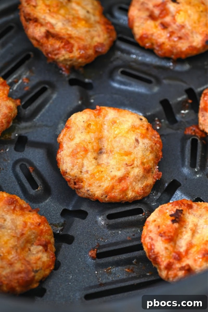 Crispy Keto Air Fryer Tuna Bites cooking in the air fryer