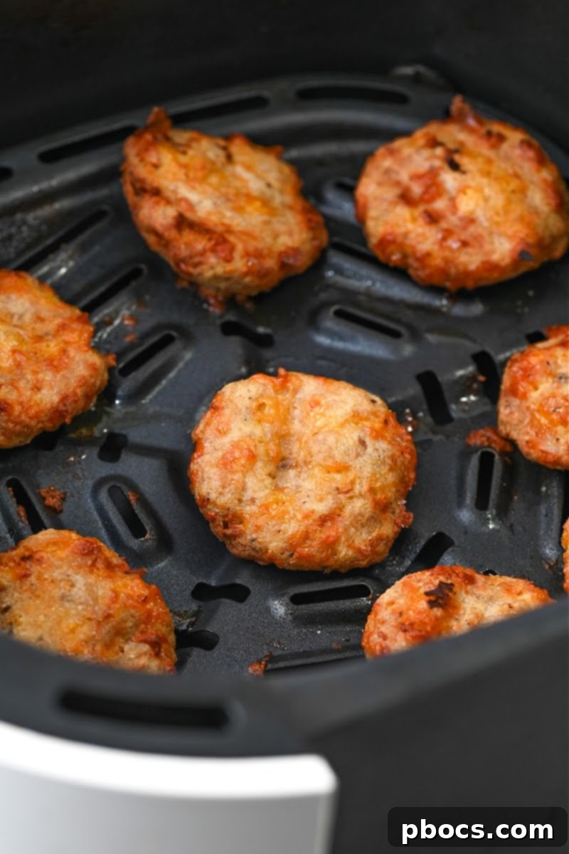 Keto Air Fryer Tuna Bites cooking in the air fryer basket