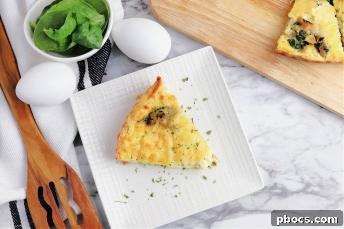 Mediterranean Keto Spinach Feta Bake 15 Freshly baked Keto Spinach Feta Quiche, sliced and ready to serve.