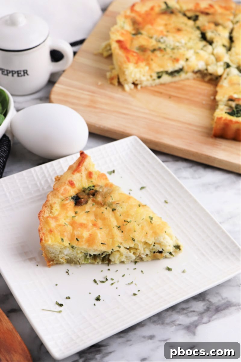 Mediterranean Keto Spinach Feta Bake 6 A generous serving of Keto Spinach Feta Quiche on a plate.