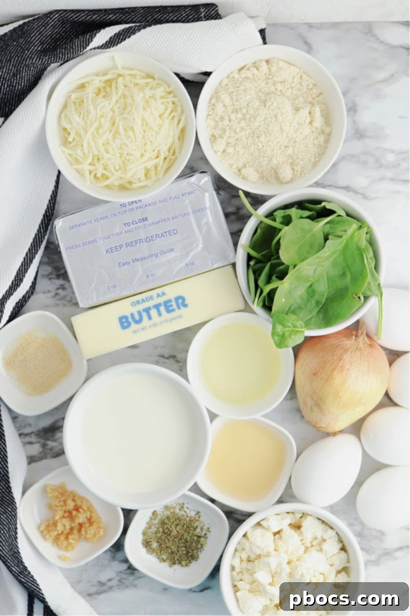 Mediterranean Keto Spinach Feta Bake 8 Ingredients for Keto Spinach Feta Quiche laid out on a table.