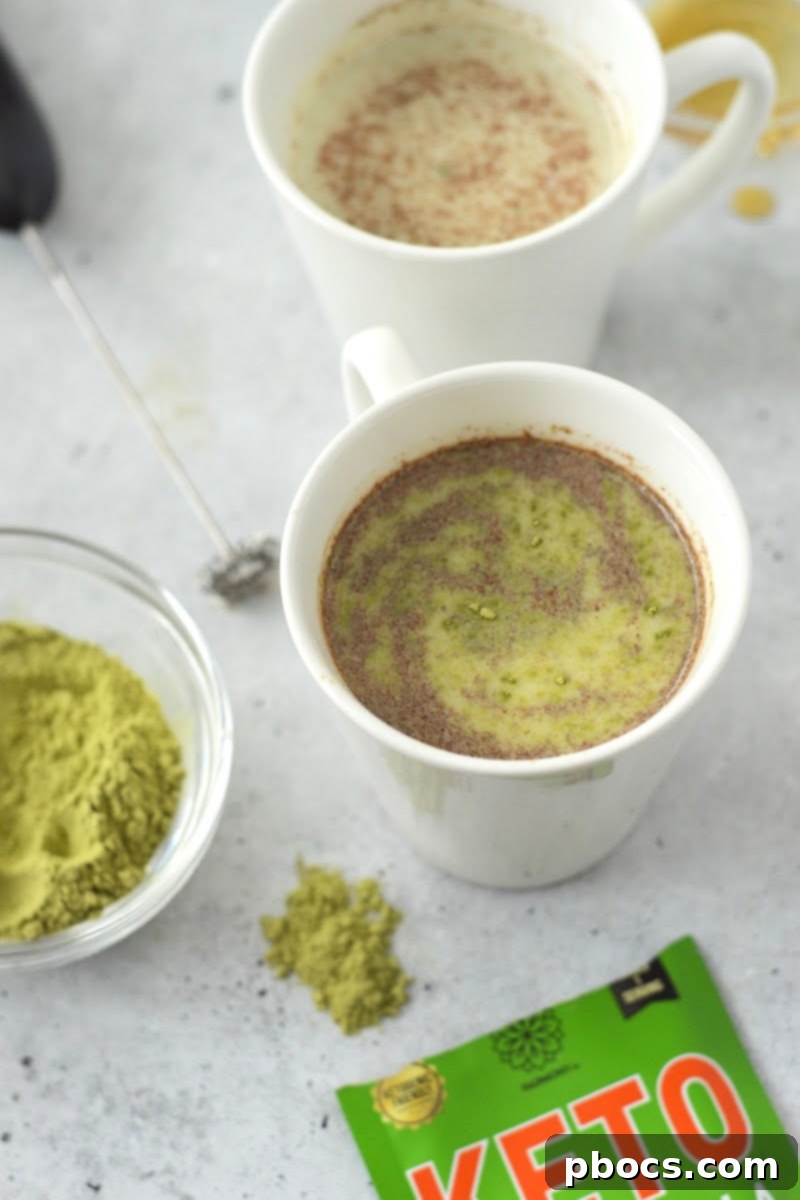 Enjoying a warm Keto Pumpkin Matcha drink on a crisp autumn day