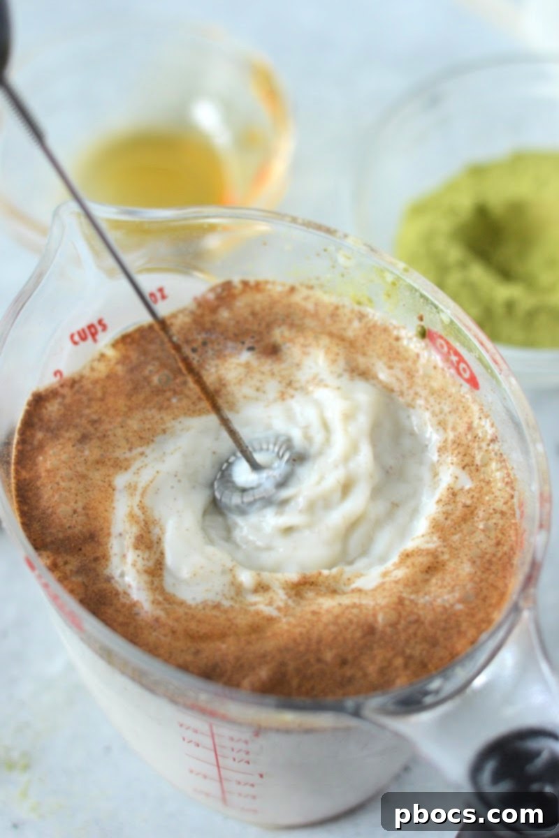 Blended Keto Pumpkin Matcha Latte in a mug