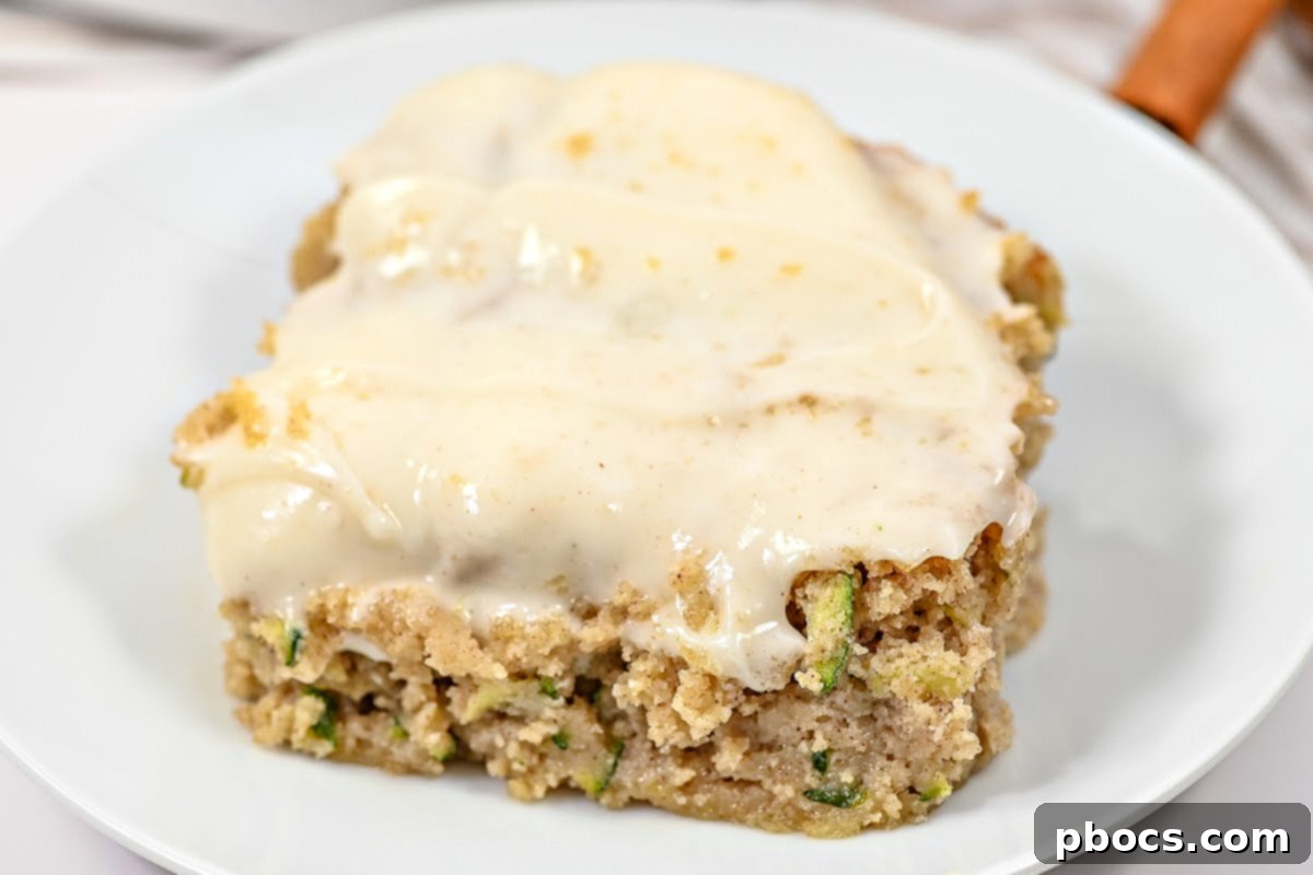Decadent Keto Cinnamon Brown Sugar Zucchini Cake 4 Close-up of Keto Cinnamon Brown Sugar Zucchini Cake slice, showing moist texture