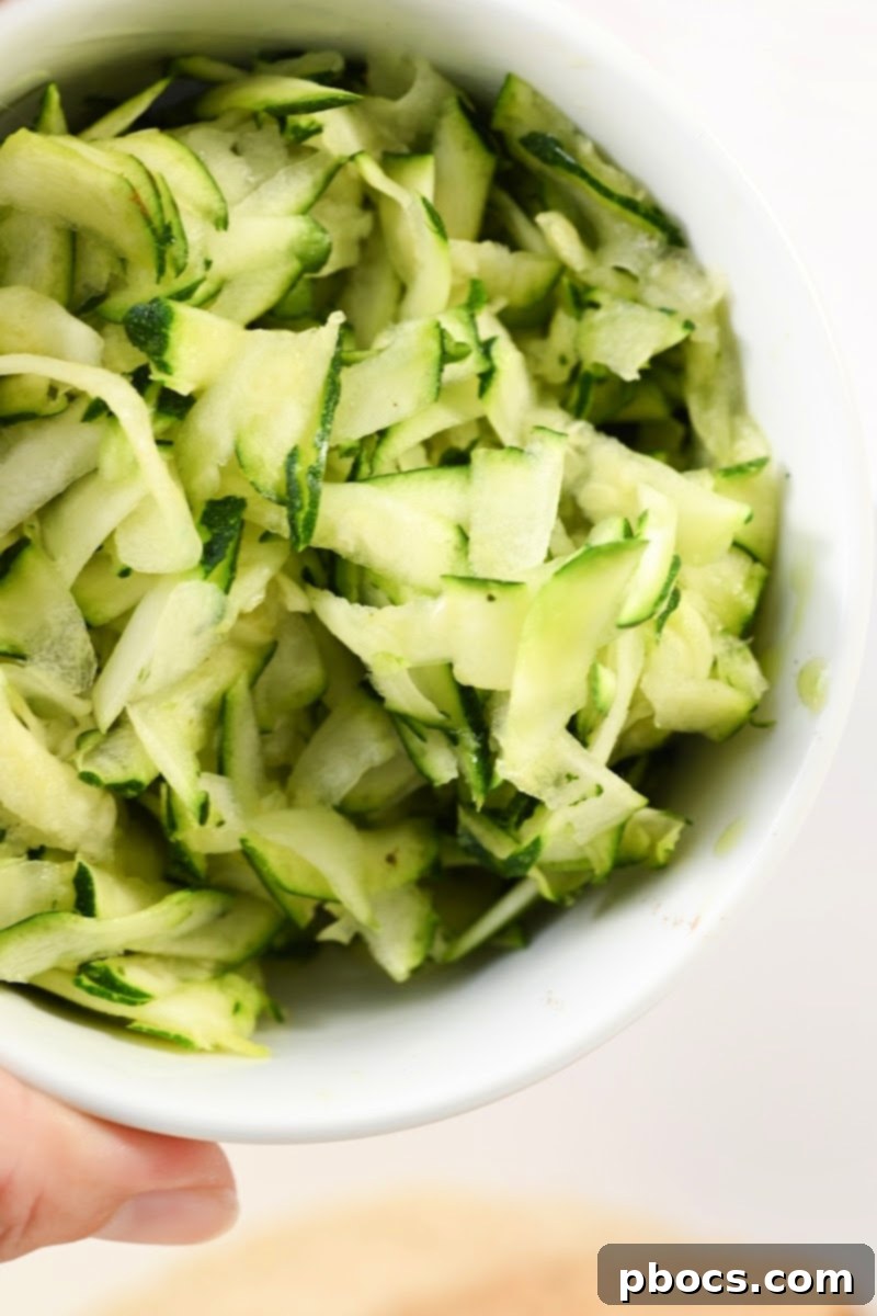 Decadent Keto Cinnamon Brown Sugar Zucchini Cake 5 Freshly shredded zucchini, squeezed of excess liquid, ready for keto baking