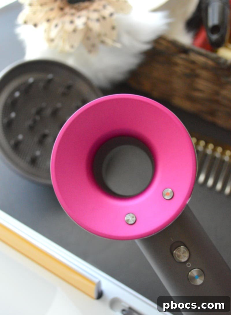 Dyson Supersonic: The Future of Hair Styling 4 Dyson Supersonic Hair Dryer achieving smooth, styled hair