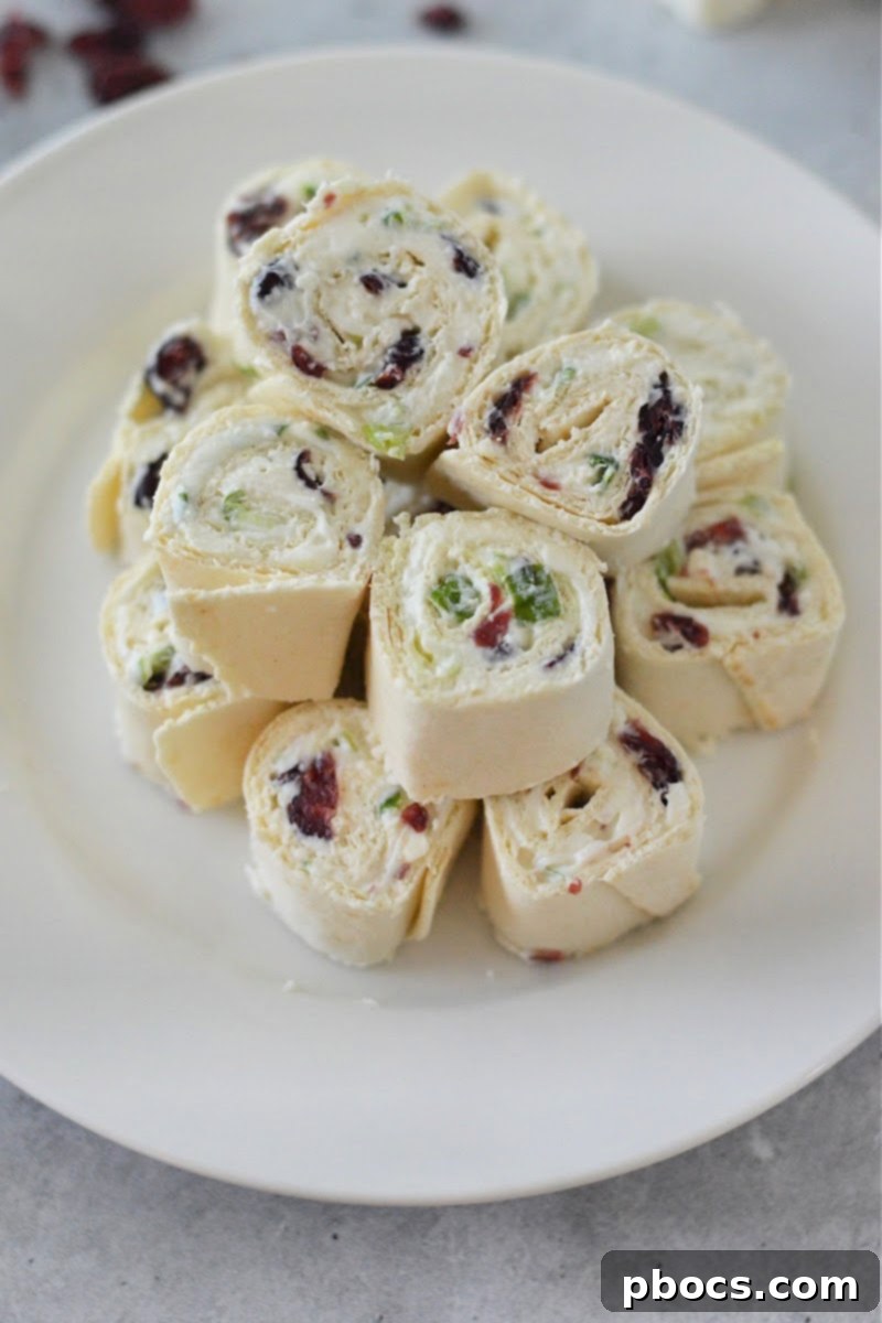 Close-up shot of Low-Carb Cranberry Cream Cheese Pinwheels, showcasing their vibrant colors and appealing texture.