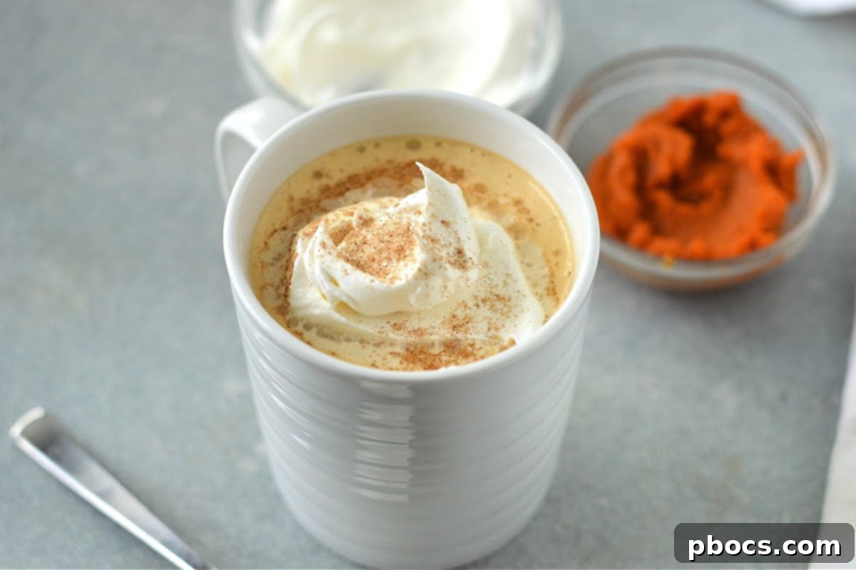 Low-Carb Pumpkin Spice Latte served with keto pumpkin chaffles and cookies