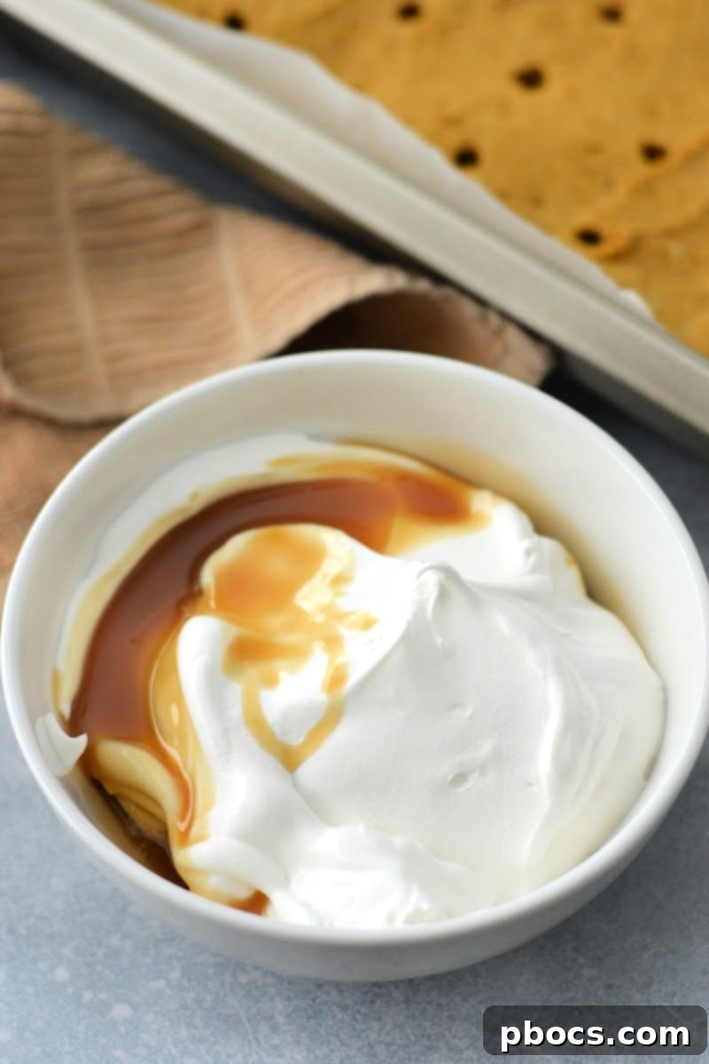Mixing sugar-free caramel sauce into whipped topping