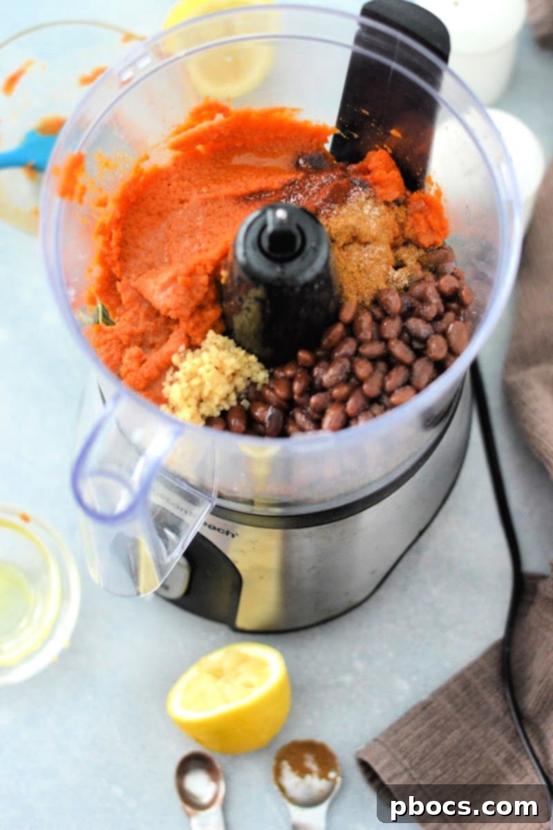 Creamy Keto Pumpkin Veggie Dip 8 Adding ingredients to the food processor