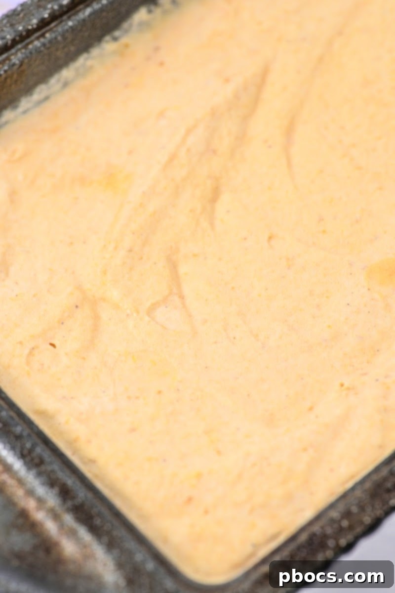 Guilt-Free Pumpkin Spice Ice Cream 11 Keto Pumpkin Ice Cream mixture spread into a loaf pan