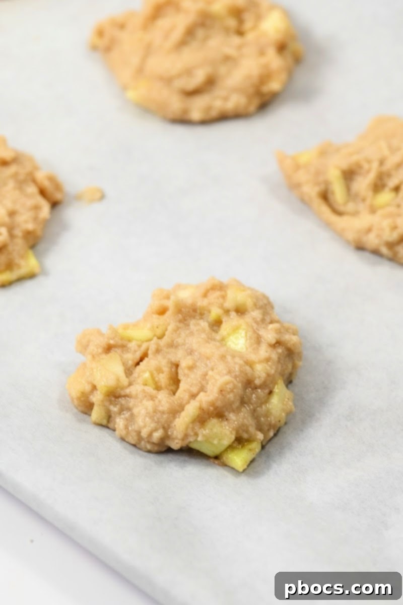 Apple Fritter Keto Cookies 12 Unbaked keto cookies dough on parchment paper
