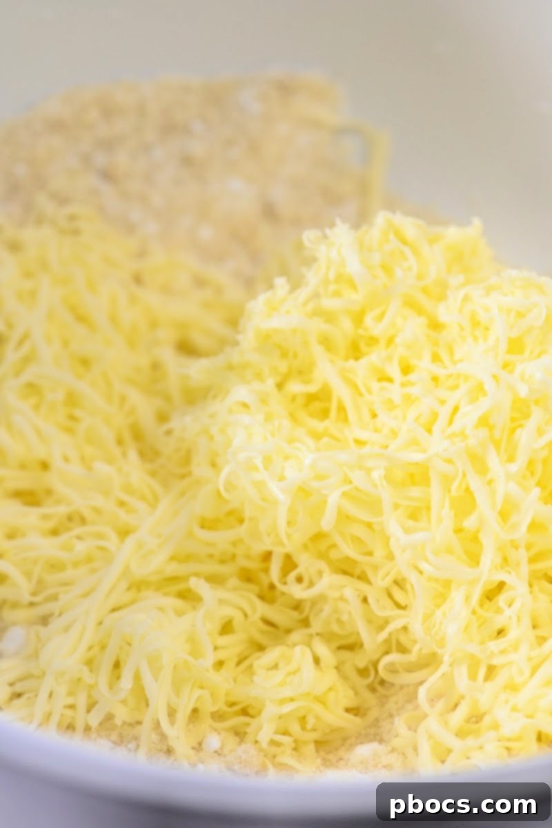 Apple Fritter Keto Cookies 10 Mixing grated cold butter into flour mixture