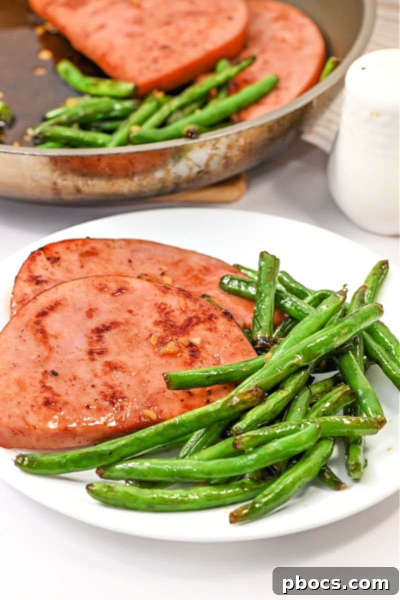 One-Pan Keto Honey-Glazed Ham and Green Beans 4 Serving of Keto Honey Glazed Ham and Green Beans Skillet, ready to eat