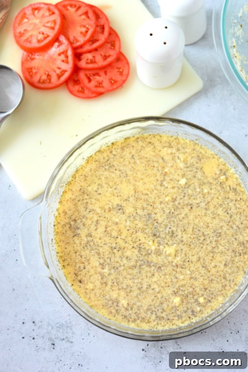 Savory Crustless Low Carb Tomato Quiche 11 Unbaked egg mixture in the pie pan